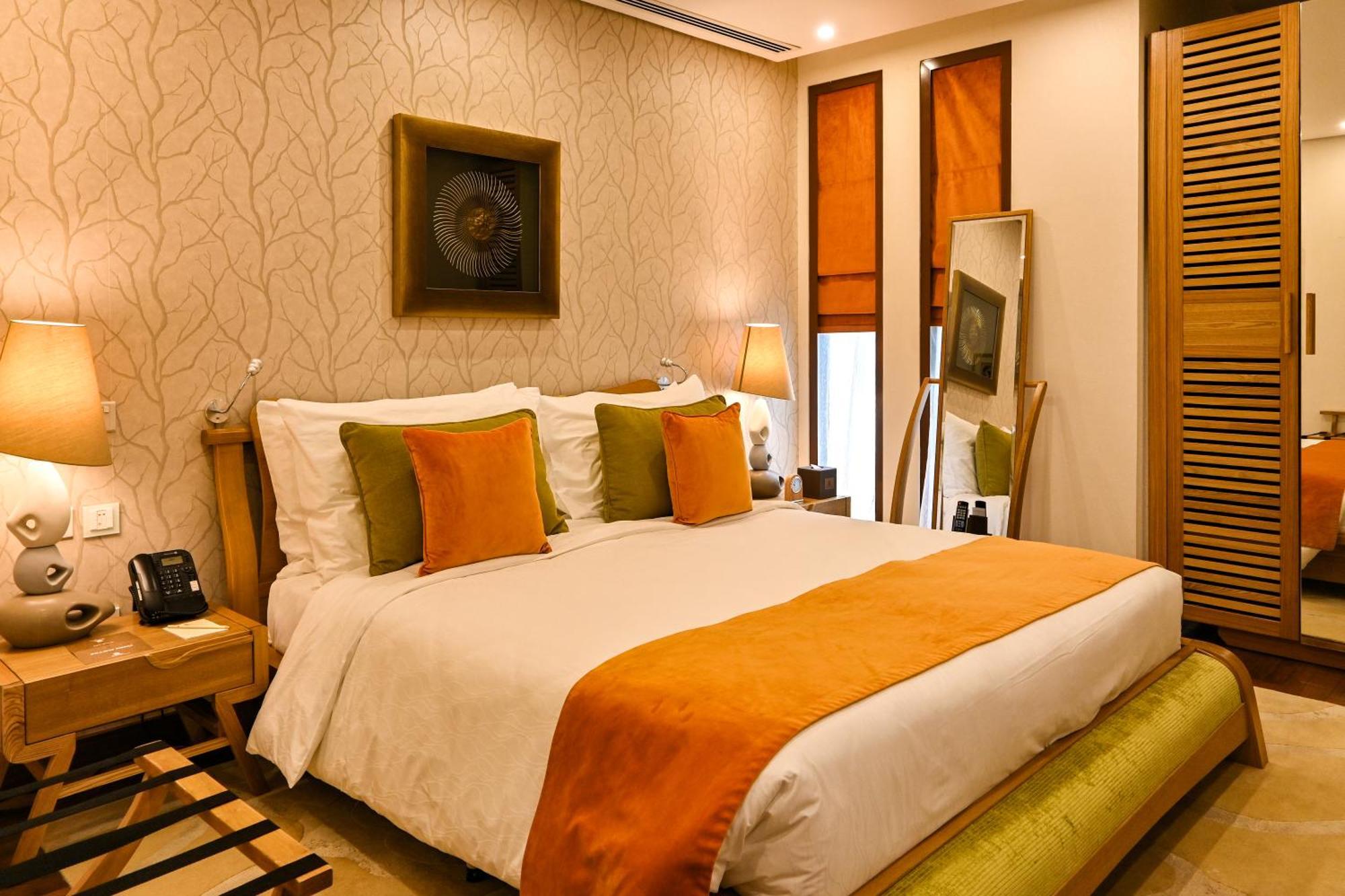 Reef Boutique Hotel Manama Extérieur photo A bedroom at the Taj Bengal